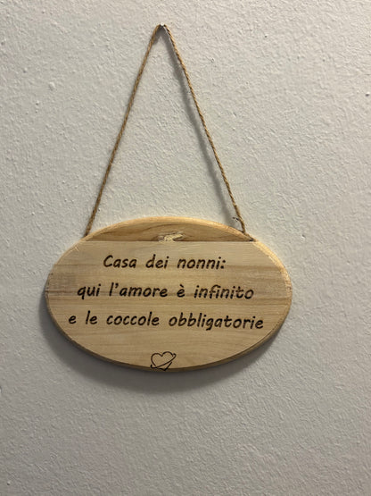 Targhetta in legno con dedica incisa